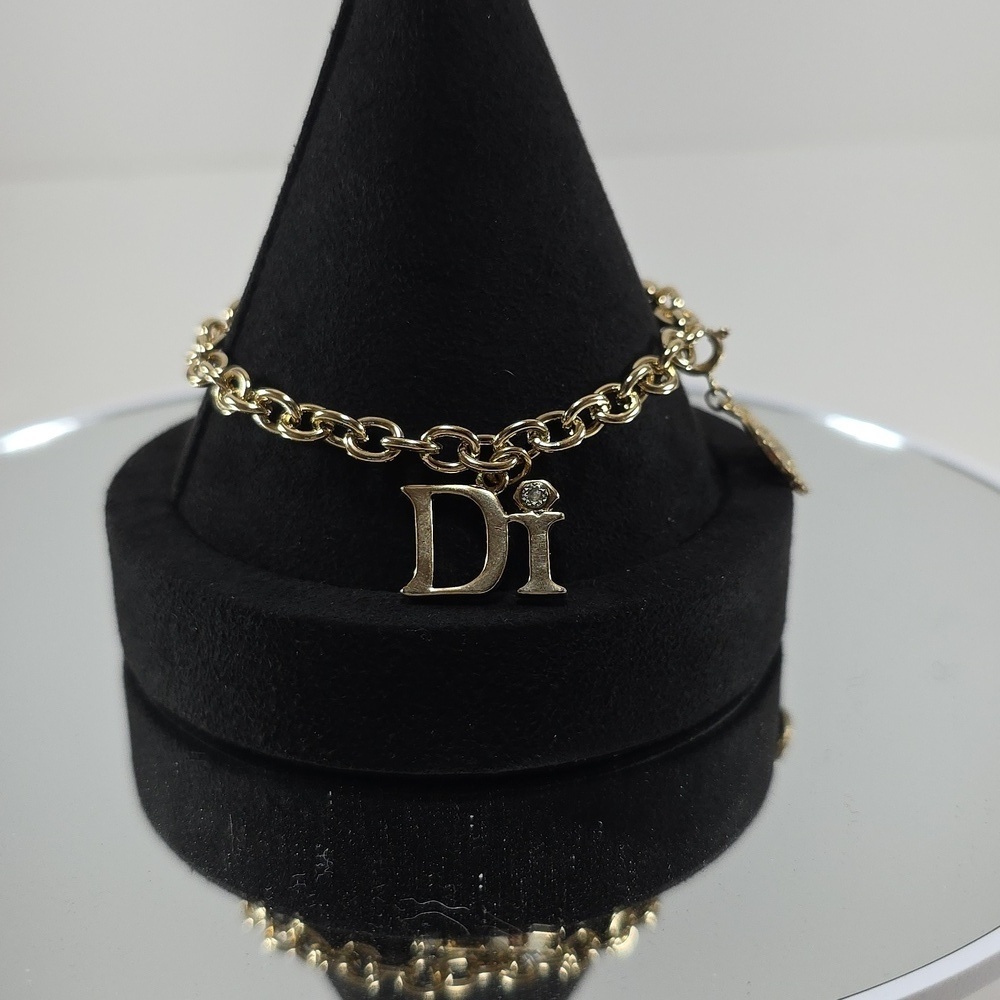 Diamonds International Gold Charm Bracelet